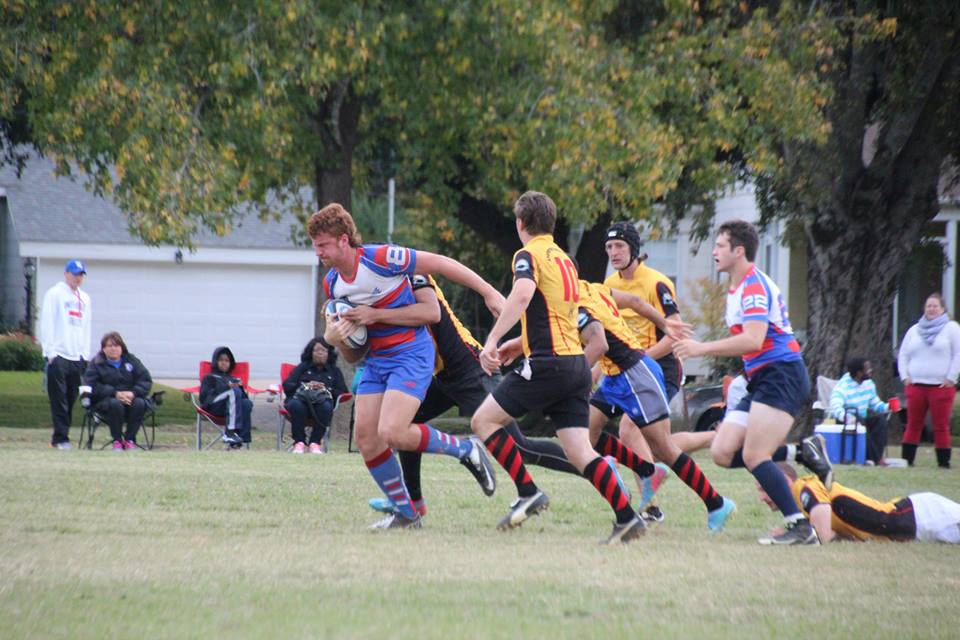 Will Crawford runs through defenders looking for the try. Photo Courtesy of Louisiana Tech Rugby 