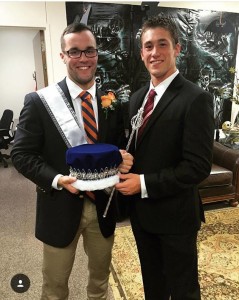 Sam Houston State Rugby player and 2015 Homecoming King, Rick Barber (left) being presented the crown by fellow player and 2014 Homecoming King, Nick Duhon (right); photo provided by Gary Meyers
